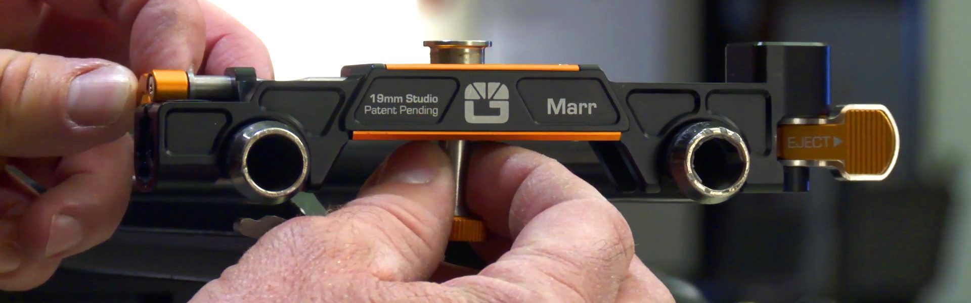 Header image for article At the Bench: Bright Tangerine 15mm & 19mm Lens Support Systems